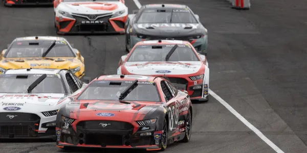 Inside a NASCAR Cup Car: Asymmetric Setup and the Physics of Oval Racing